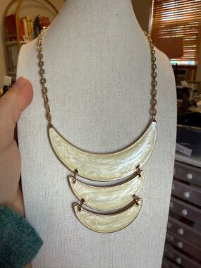 The Limited Gold-Tone Necklace with Cream Marbled Crescents